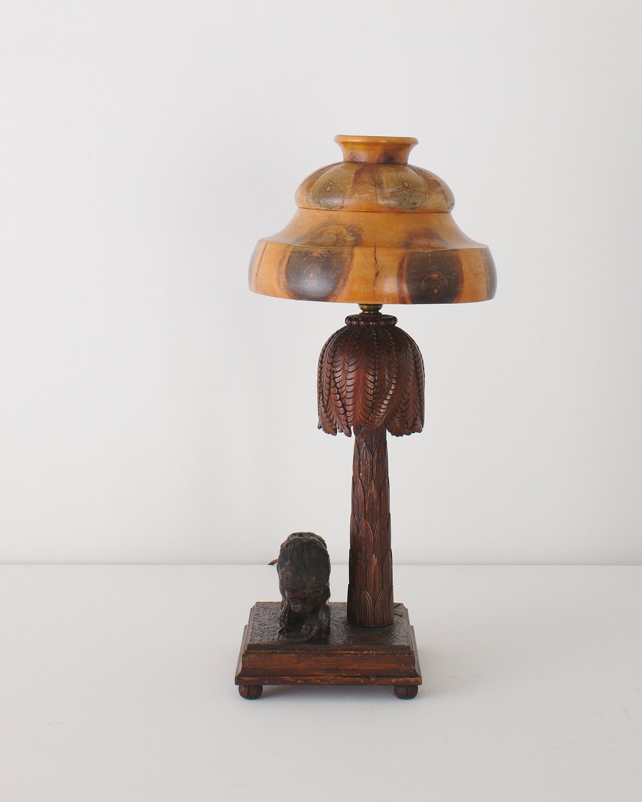 CARVED WOOD LION FIGURAL LAMP WITH MONKEY PUZZLE WOOD SHADE